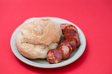 fresh bread in small backet on blue background