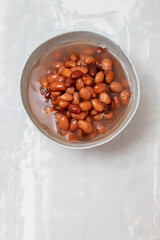 canned food boiled brown beans on bowl