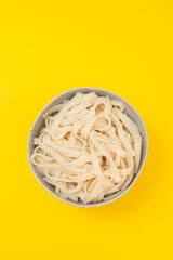 boiled noodle Udon on gray ceramic bowl