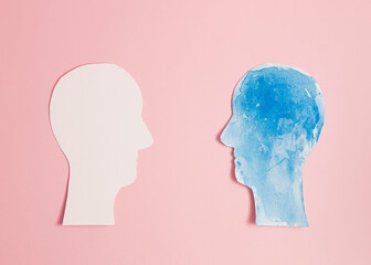 Mental Health Disorder Concept. Bipolar Disorder Person. Unstable Psycho. Layers of Paper Cut as Human Head presenting Different of Emotions. Happiness and Depression Emotion inside.