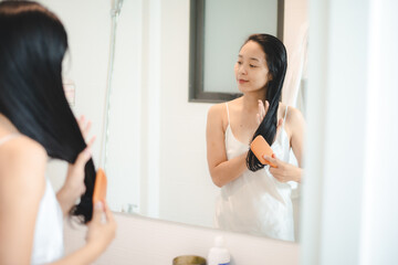 Asian female woman in beauty treatment concept, young woman hair cosmetic care