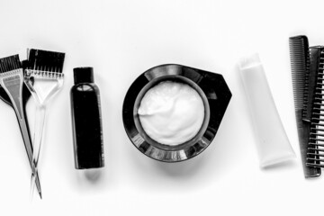 hairdresser woorking desk with tools on white background top view