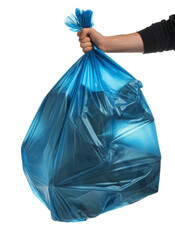 Man holding trash bag filled with garbage on white background, closeup