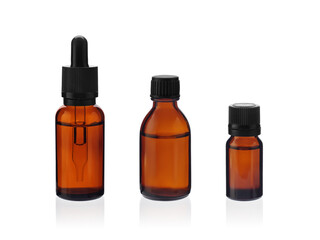 Set of different brown bottles without labels for cosmetics, essential oil and other liquid products isolated on white background, mock up.