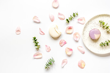 light breakfast disign with flowers on white table top view
