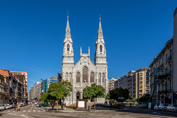 Fototapeta premium Aviles - Spain. City Streets, Colegio San Nicolás de Bari, Iglesia de Santo Tomás de Canterbury, sidrerias. Beautiful city streets in Aviles - Spain