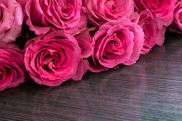 Bouquet of red roses on dark background. Valentine's day concept.