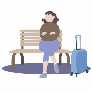 Femme qui attend sur un banc. Femme qui part en vacances. Femme &eacute;nerv&eacute;e par le retard de son train.