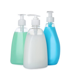 Dispensers of liquid soap on white background