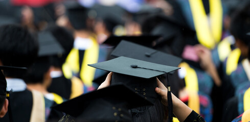 back of graduates during commencement.