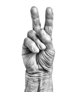 the old hand gesture showing number two or victory