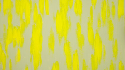Hand drawing with acrylic yellow and gray paint. Abstract artistic background. Paint strokes. Colors trends 2021.	