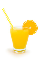 A glass of orange juice with a straw and orange slice on the top of the glass