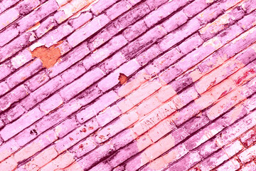 Texture of a brick wall with cracks and scratches which can be used as a background