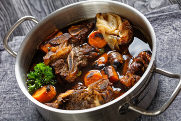beef broth of beef meat on bones with spices