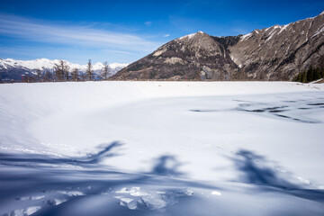 Mountain lake landscape in winter