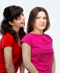 Happy friends  hugging each other.Teenage girl using smart phone.Selfie.Girl have fun .