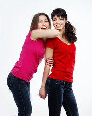 Happy friends  hugging each other.Teenage girl using smart phone.Selfie.Girl have fun .