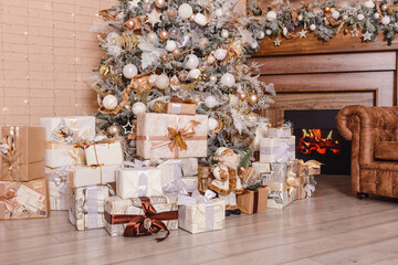 boxes with gifts under the Christmas tree
