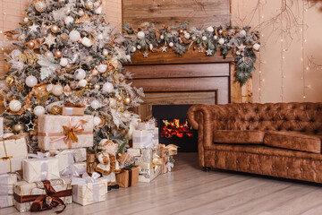 Christmas tree and fireplace in the room
