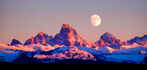 Sunset Light Alpen Glow on Tetons Teton Mountains wtih Moon Rising