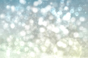 Abstract blurred festive delicate winter christmas or Happy New Year background with shiny blue green and white bokeh lighted circles stars. Space for your design. Card concept.