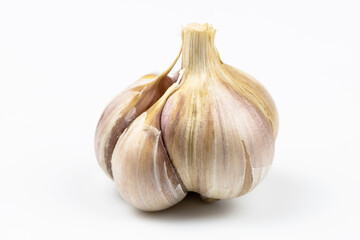 Garlic close-up isolated on a white background.