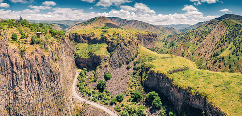 Aerial view of the natural wonder of Armenia - majestic gorge of Azat river canyon - a Symphony of Stones or basalt Pillars in Garni
