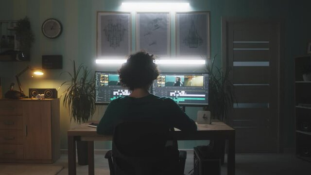 Video editor working at night