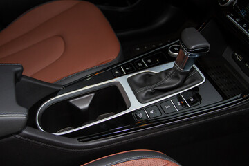 Obraz na płótnie Canvas Car interior console close up view. Gear stick with multimedia console.