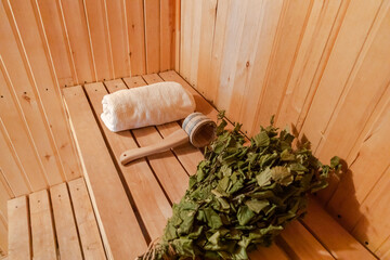 Traditional old Russian bathhouse SPA Concept. Interior details Finnish sauna steam room with...