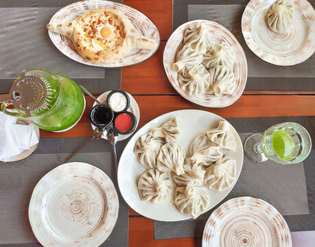 Georgian cuisine with khinkali, Adjarian khachapuri and tarhun lemonade