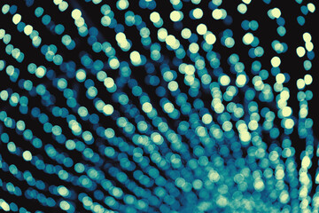 Abstract blurred background, blue defocused lights Bokeh on black background, glittering circle pattern