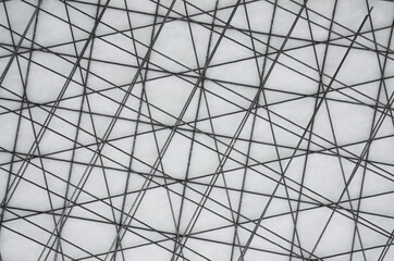 Fototapeta premium many layers of metal mesh in the snow. for design and abstract background