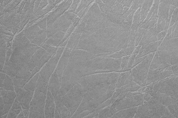 Smooth and gray leather texture.