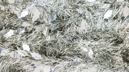 Christmas decoration isolated on white background. Silver tinsel Xmas ornaments