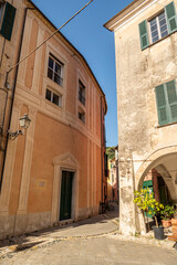 Fototapeta na wymiar Characteristic streets in the historic center of FInalborgo
