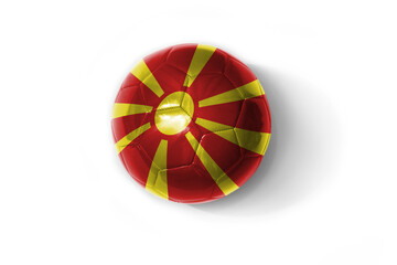 Obraz premium realistic football ball with national flag of macedonia on the white background