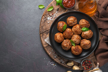 Fried Meatballs on a wooden board. Meat dish.