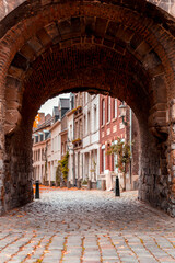 Fototapeta na wymiar Helpoort stone gate of the old city walls of Maastricht, Netherlands