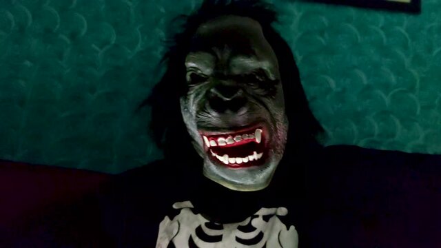 Girl in Halloween gorilla costume