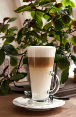 Coffee latte in a tall glass