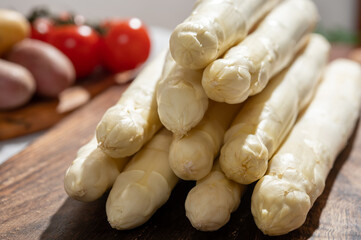 New harvest of high quality German white asparagus washed, uncooked, tasty vegetarian dinner