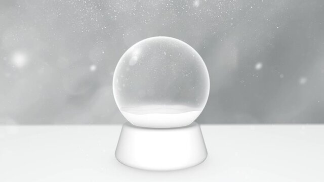 Bright clean  snow globe on white background with falling glitter snowflakes. Concept holiday christmas ornament souvenir. 