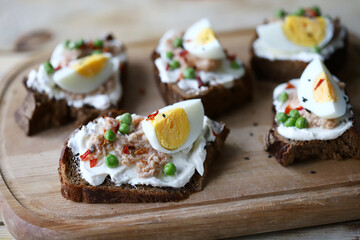 Healthy toast with cream cheese, tuna and egg. Diet food. Keto toast.