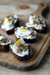 Healthy toast with cream cheese, tuna and egg. Diet food. Keto toast.