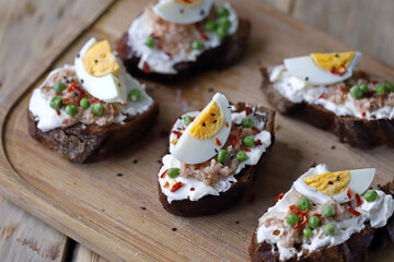 Healthy toast with cream cheese, tuna and egg. Diet food. Keto toast.