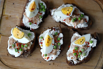Healthy toast with cream cheese, tuna and egg. Diet food. Keto toast.