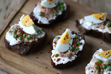 Healthy toast with cream cheese, tuna and egg. Diet food. Keto toast.