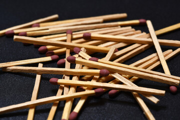 close up of matches on black background. selective focus